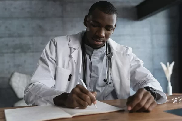 Doctor writing